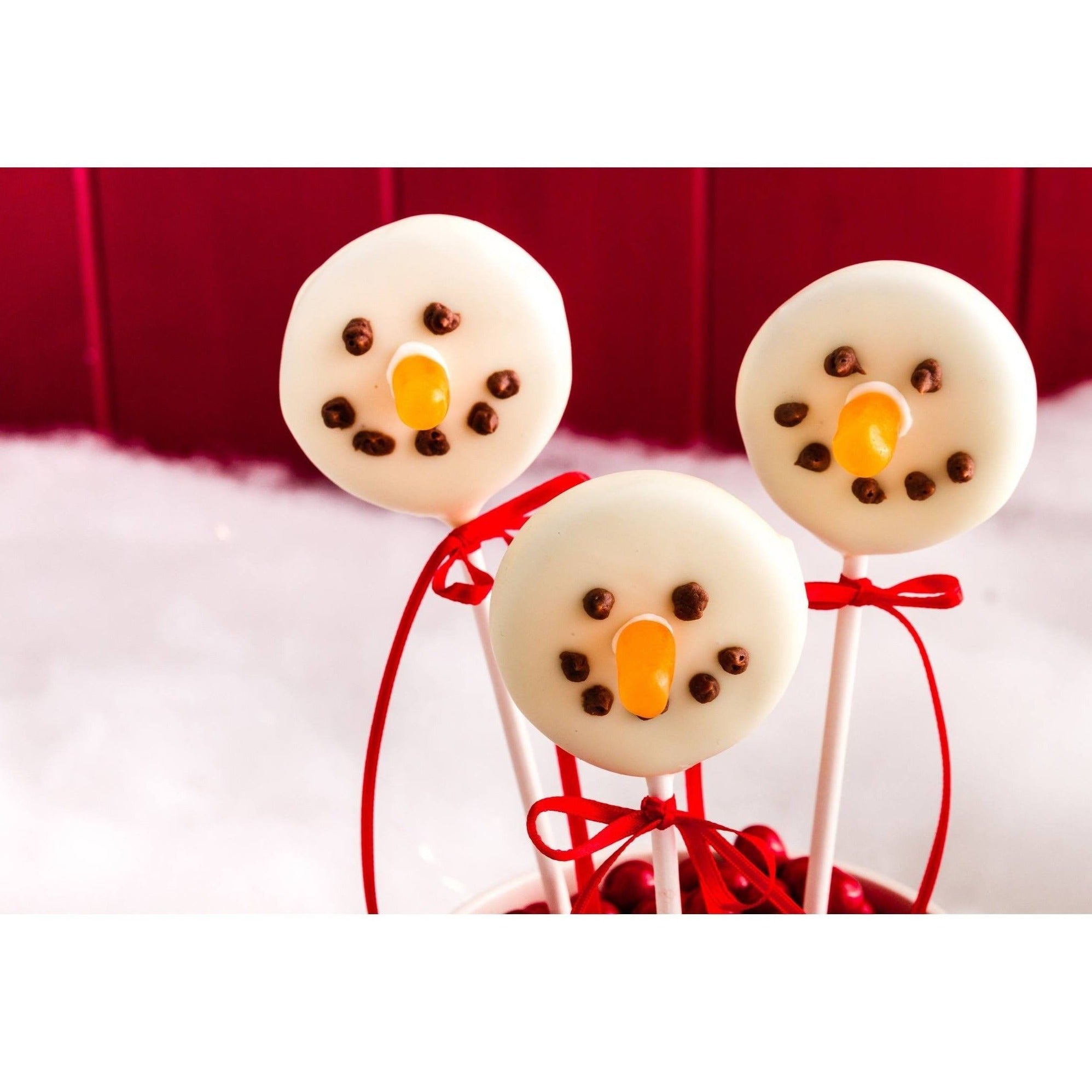 close up of two cake pops with chocolate and decoration with sugar in star  shape, bokeh in the background Stock Photo - Alamy